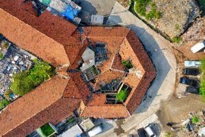 a tile roof that was damaged by a hurricane