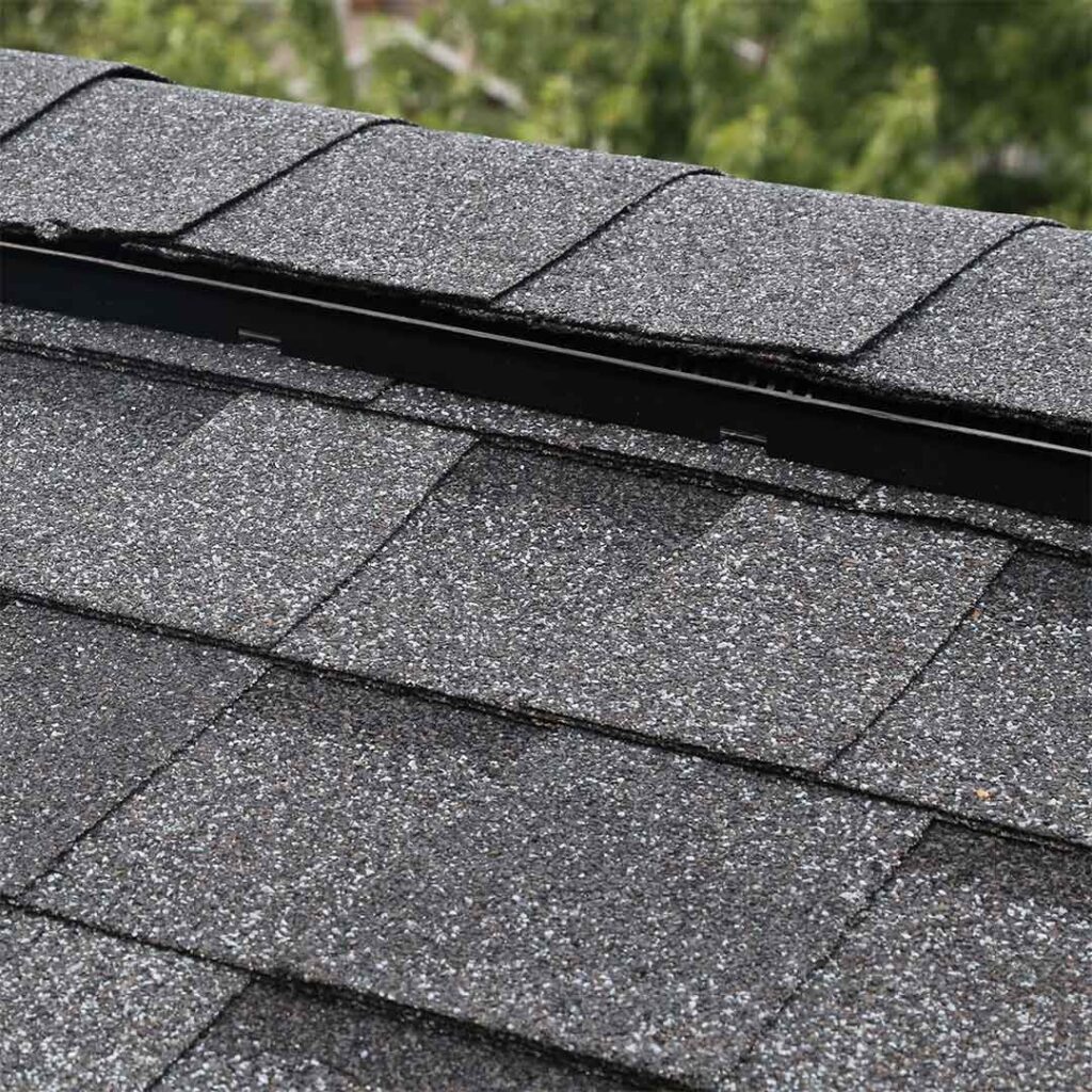 Close-up of asphalt shingles on a residential roof.