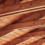 Close-up of finished wood roof decking or attic framing.