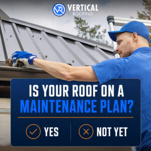 Vertical Roofing technician performing preventative roof maintenance and clearing debris from a residential roof